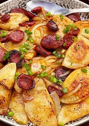A picture of Brown Butter Pierogi with Wagyu Beef Kielbasa.