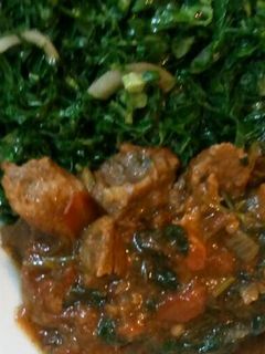 A picture of Wet fried Beef with Sukuma wiki.