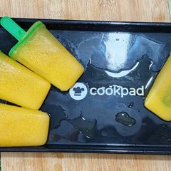 A picture of Orange popsicles.