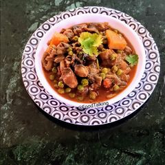 A picture of Paddy Straw Mushroom And Peas Curry.