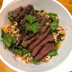 A picture of BBQ beef warm salad.