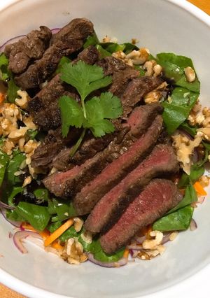 A picture of BBQ beef warm salad.