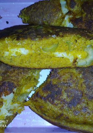 Una foto de Torta integral de kabutiá con queso y aceitunas
