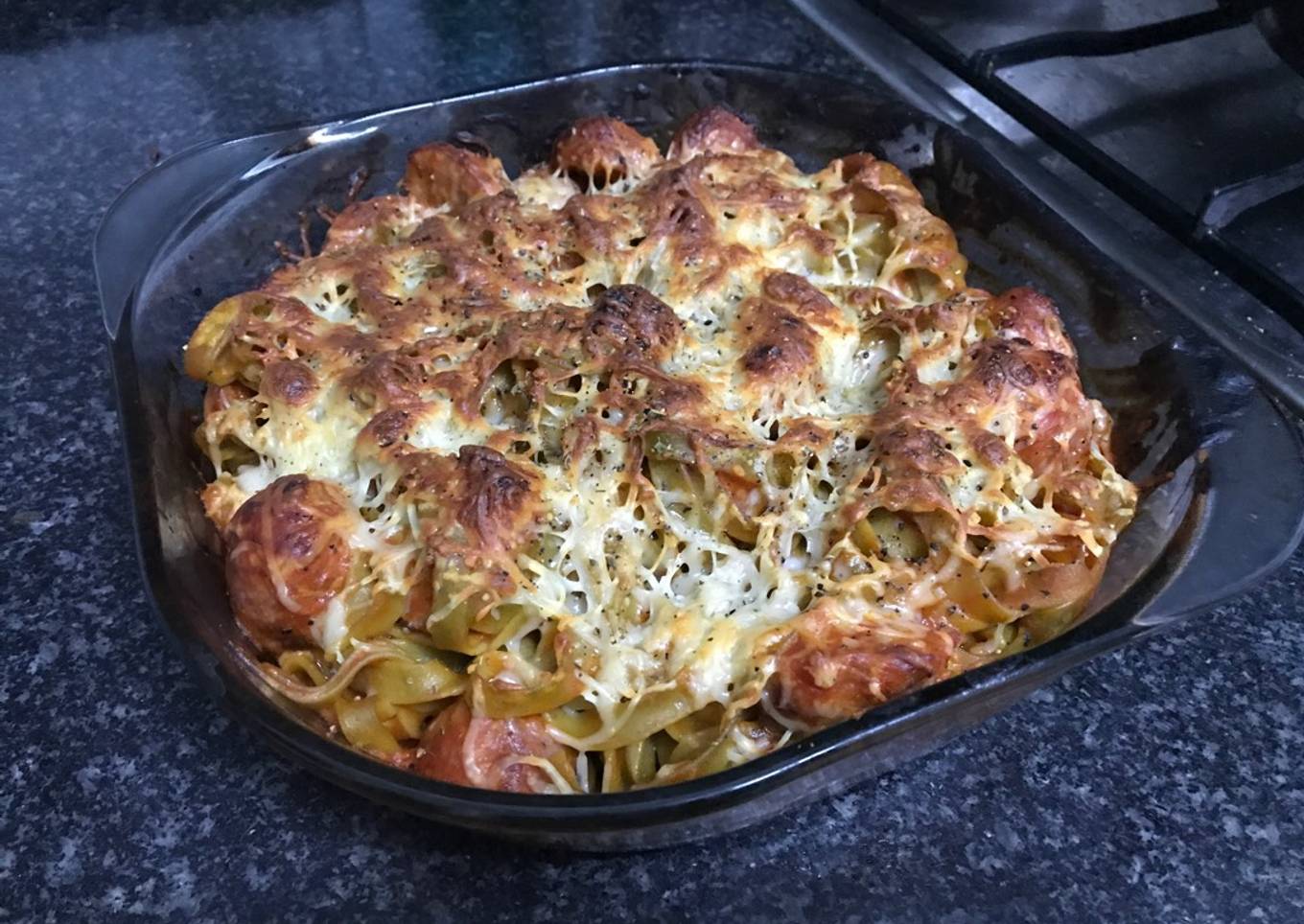 Nidos de espinacas gratinados con albóndigas