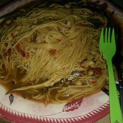 A picture of Spaghetti beans jollof wit fish.