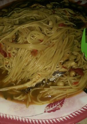 A picture of Spaghetti beans jollof wit fish.