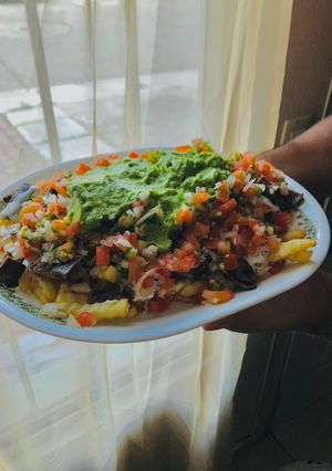 Una foto de Carne asada fries 🍟🍖