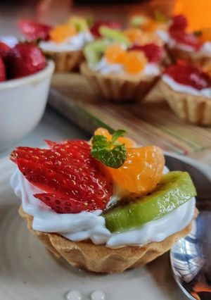 A picture of Fresh fruit tarts.