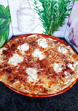 Une photo de Tarte fine au fromage de tête et lardons 😋