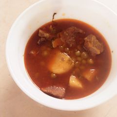 A picture of Aloo matar gosht.