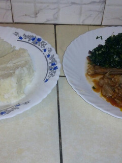 A picture of Ugali kales with beef stew.