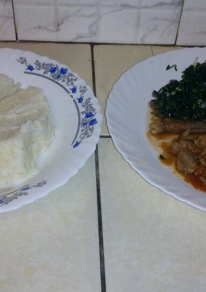 A picture of Ugali kales with beef stew.