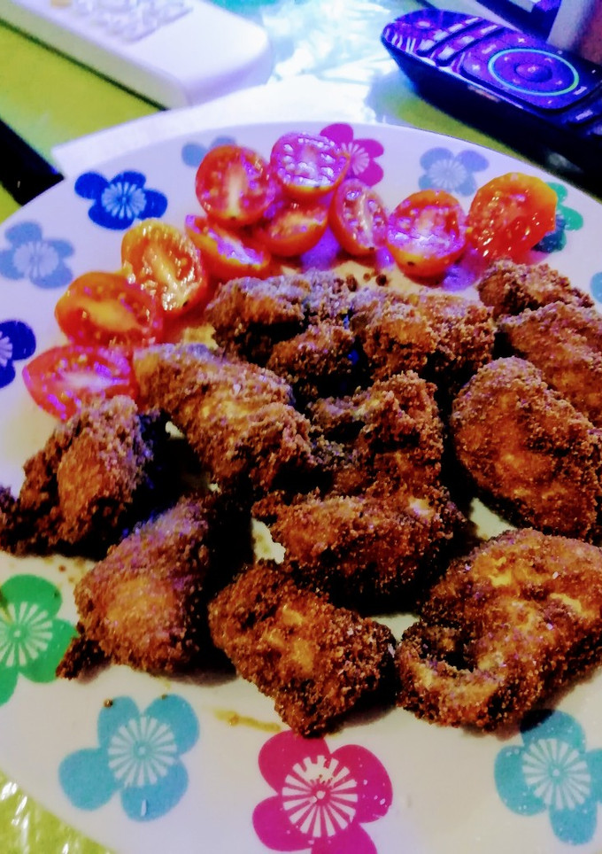 Una foto de Nuggets de pollo con tomatitos cherry
