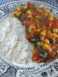 Una foto de Garbanzos con tomate y arroz