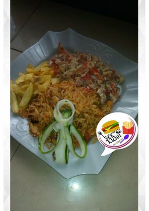 A picture of Jollof rice with Irish and scramble egg.