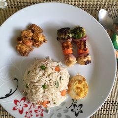 Veg Pulao with Kadai Paneer masala, boiled egg fry and grilled veggies with Paneer A picture of Veg Pulao with Kadai Paneer masala, boiled egg fry and grilled veggies with Paneer.