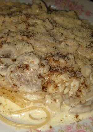 Una foto de Fideos con crema de champiñones.
