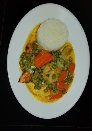 Una foto de Pollo arvejado