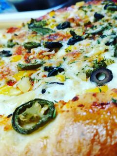 A picture of 🍕The Best Pizza.