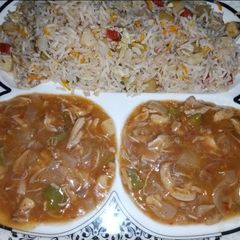 Veg Fried rice with chili chicken sauce A picture of Veg Fried rice with chili chicken sauce.