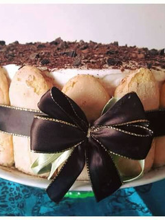 A picture of AMIEs Special TIRAMISU Cake.