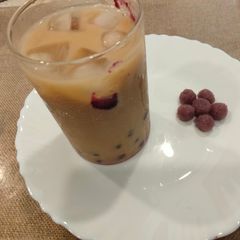 A picture of Homemade Jamun flavour Boba pearls tea.