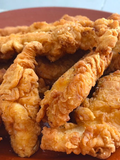 Una foto de Pollo estilo Crispy Strips KFC 🇺🇸