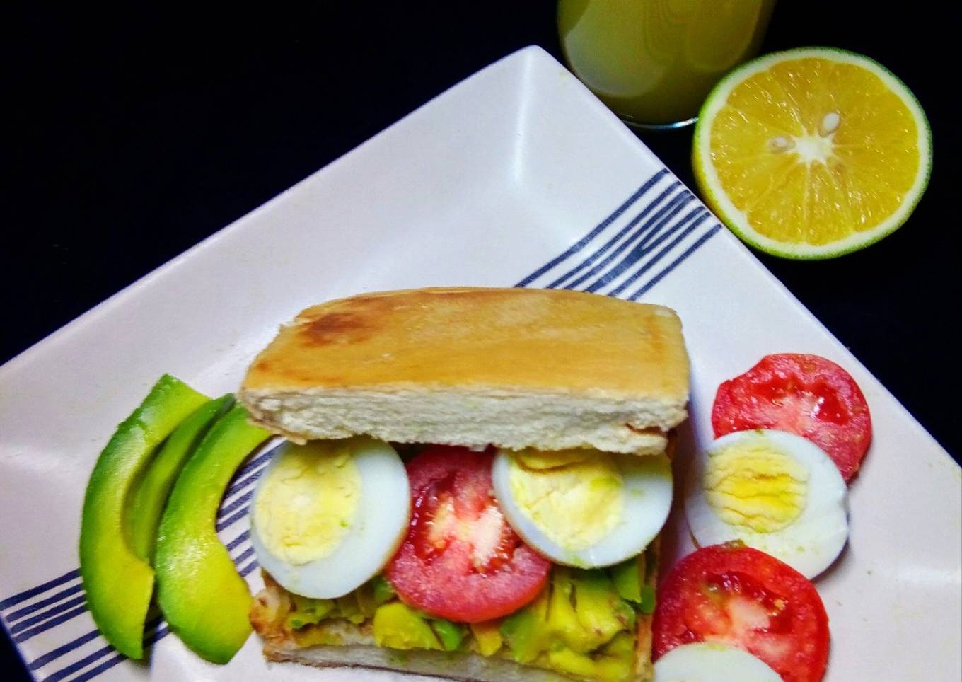 Avocado, tomato and egg sandwich
