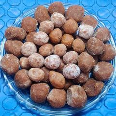 A picture of Aamla sweet goli (candy).