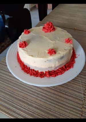 A picture of Fruit cake with orange buttercream.