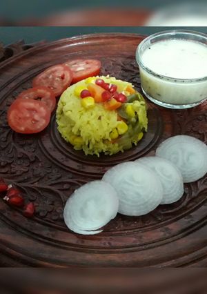 A picture of #dinner1 Mix veg khichdi and kadhi.