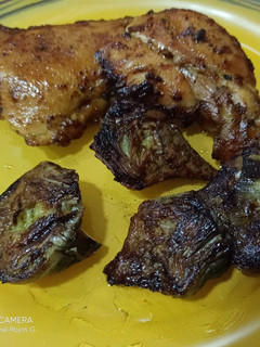 Una foto de Cuartos de pollo al horno con especias