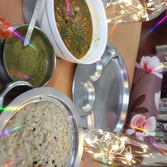 A picture of South Indian Pongal, Brinjal sabji dhania chutney.