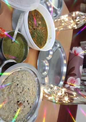 A picture of South Indian Pongal, Brinjal sabji dhania chutney.