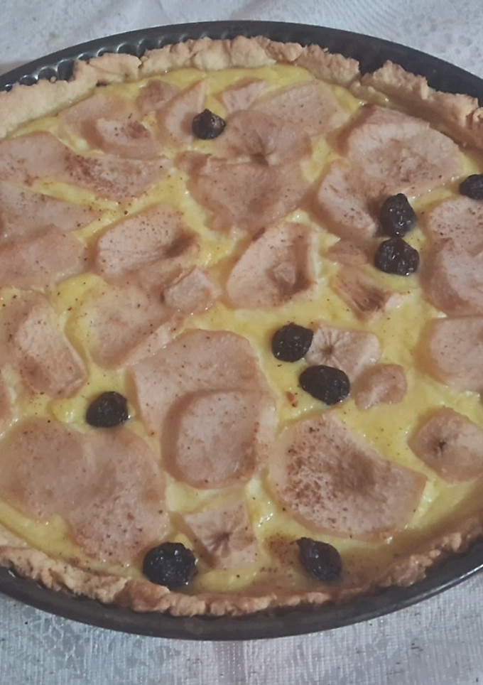 Una foto de Tarta de crema pastelera y peras 🍐🍐
