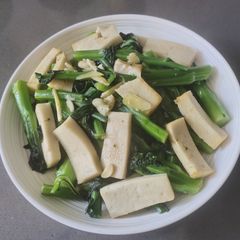 A picture of Sautéed Choy Sum with Fish Block.