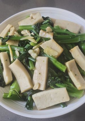 A picture of Sautéed Choy Sum with Fish Block.