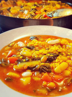 Una foto de Arroz meloso con acelgas. Arròs en bledes
