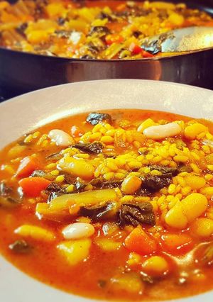 Una foto de Arroz meloso con acelgas. Arròs en bledes