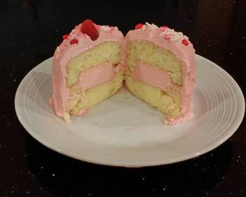 Fresh, Prepare Recipe Vanilla Butter Cakes filled and Frosted with Whipped White Chocolate Rasberry Ganache Delicious Nutritious