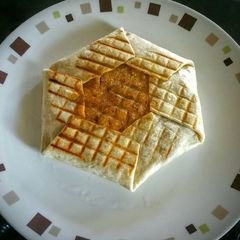 A picture of Paini press vegetarian crunch wrap.