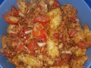 A picture of onion tomato maggie