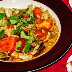 A picture of Fagioli italian stew with orzo pasta and veggies.