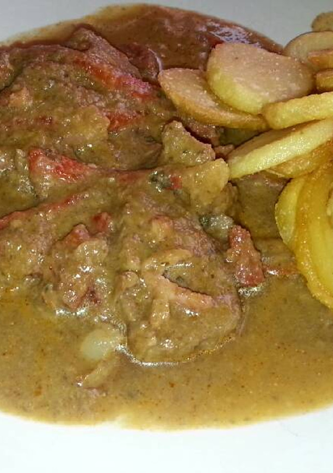 Una foto de Solomillo en salsa de champiñones con tropezones
