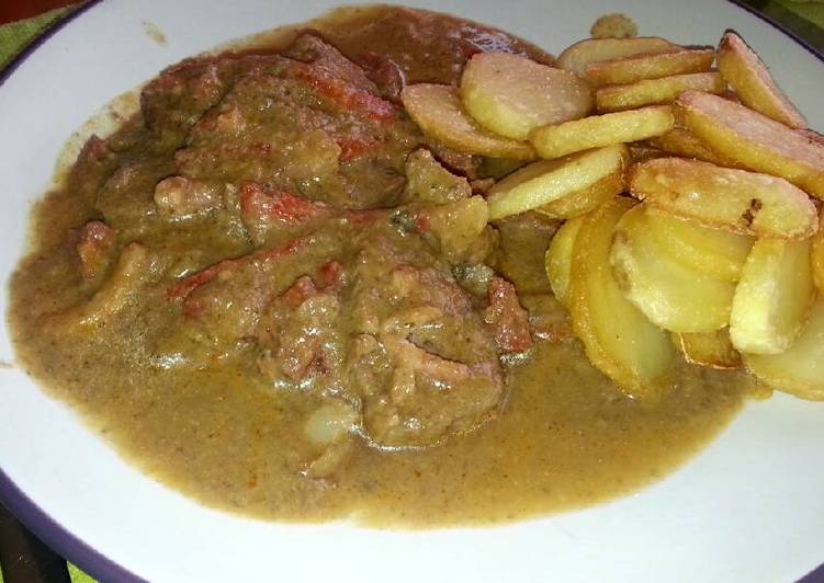 Solomillo en salsa de champiñones con tropezones