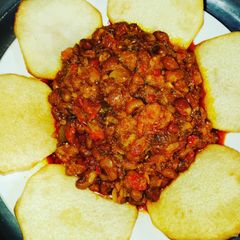 A picture of Beans and fried yam.
