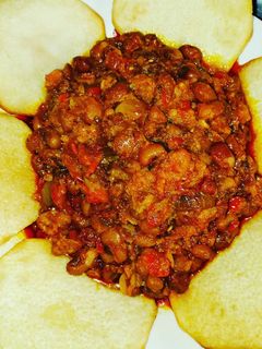 A picture of Beans and fried yam.