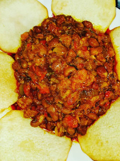 A picture of Beans and fried yam.