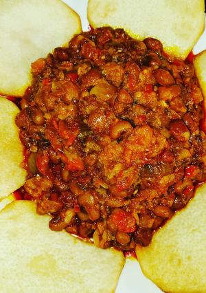 A picture of Beans and fried yam.