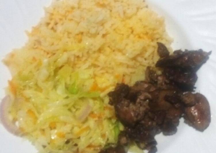 Steamed cabbage served with rice and chicken liver